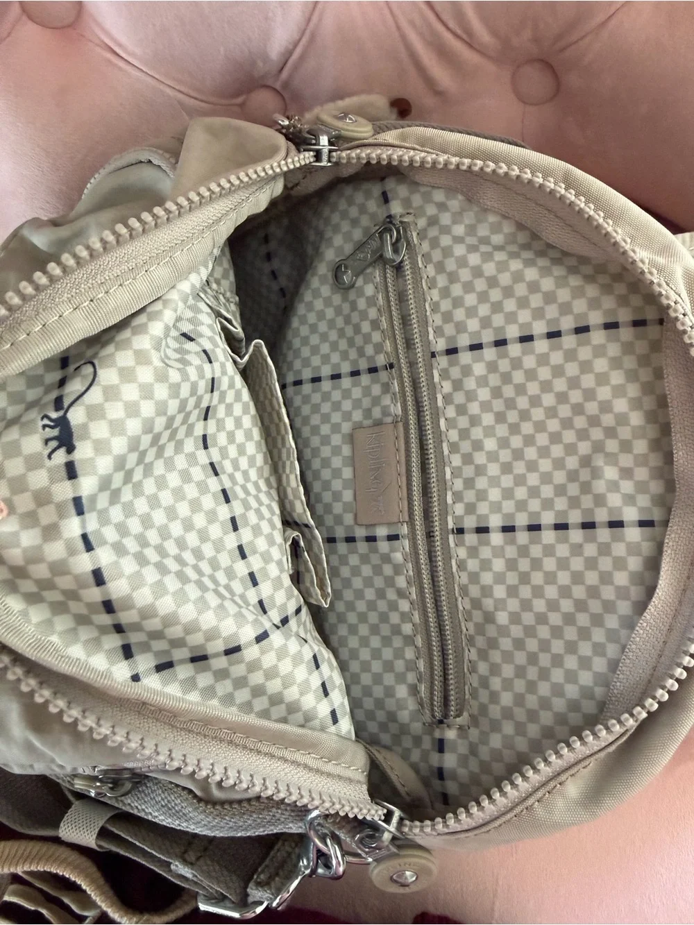 The Kipling Firefly Up Convertible Backpack